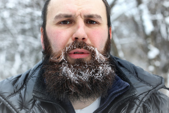 bearded man ice snow winter