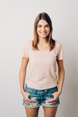 Trendy modern young woman in denim shorts