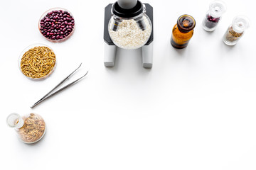 Food analysis. Rice under the microscope on white background top view copyspace