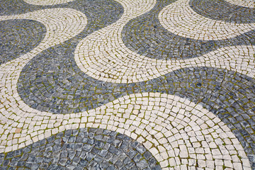 Detail of a cobblestone pavement - Lisbon, Portugal.
