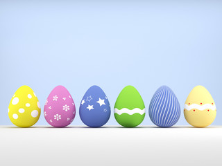 Six colored easter eggs on blue background