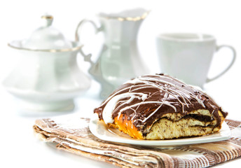 bun covered chocolate and glaze