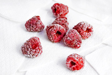 berries raspberries on napkins © Nataliia Makarovska
