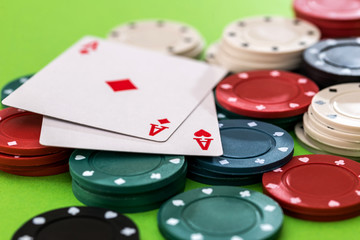 Poker chips and cards on the table at the casino
