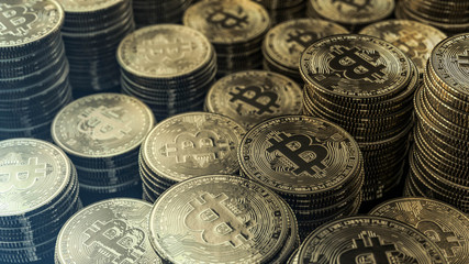 bitcoins on black background future of economy