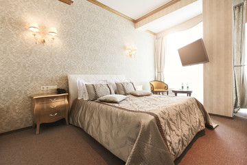 Interior of double bed hotel bedroom