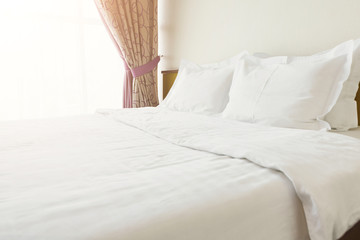 Interior of double bed hotel bedroom