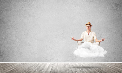 Fototapeta premium Young man keeping mind conscious.