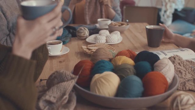 Young girls in knitting studio