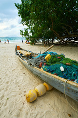 fishing boat with all equipment for fishing on the beau vallon beach, seychelles