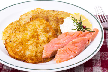 Potato pancakes with smoked salmon and cheese cream