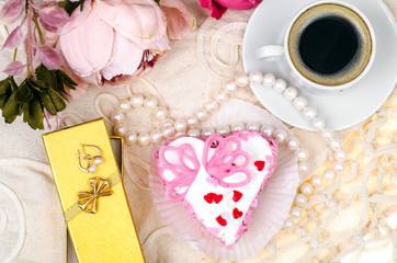 Obraz na płótnie Canvas Delightful, luxury, romantic cake in the form heart. Valentine's Day on February 14.