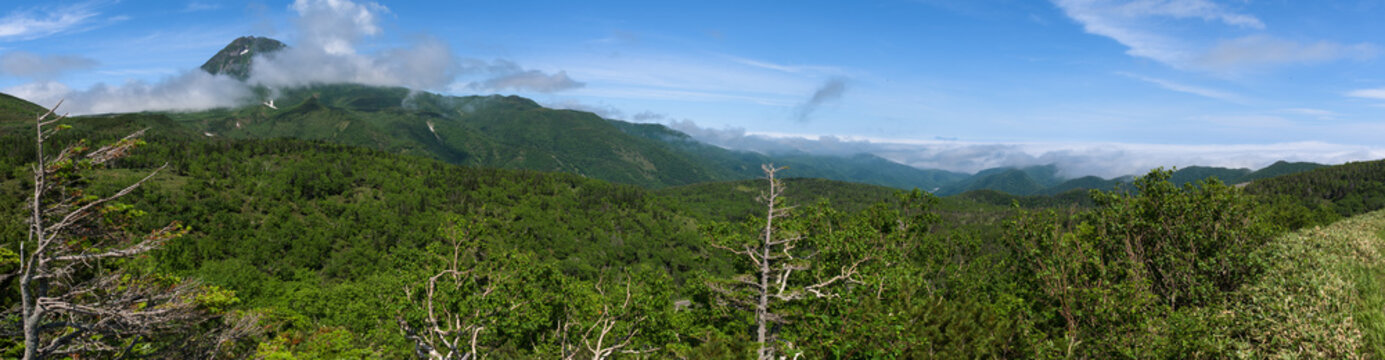 Panoramic views from the green Shiretoko Pass around Mount Rausu in Shiretoko National Park, Hokkaido, Japan