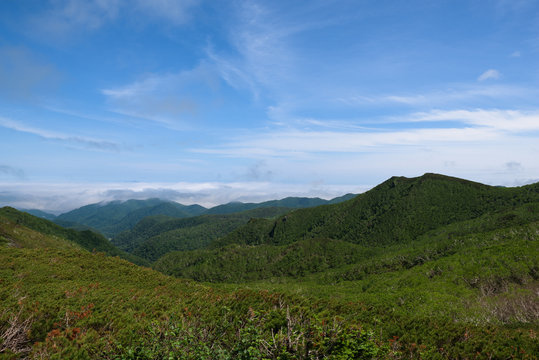 Panoramic views from the green Shiretoko Pass around Mount Rausu in Shiretoko National Park, Hokkaido, Japan