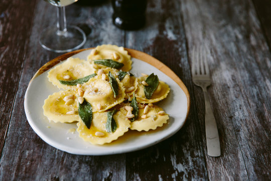 Ravioli with sage butter and pine nuts