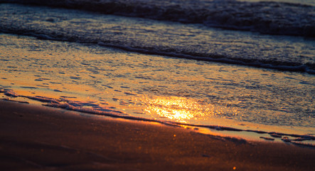 A beautiful, colorful sunset at the Baltic sea beach. Vivid natural scenery.