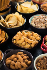 Salty snacks served in bowls