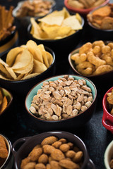 Salty snacks served in bowls