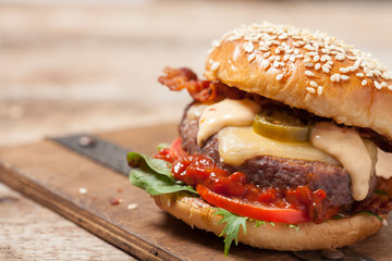 Two cheeseburgers on sesame buns