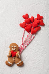 Cute ingerbread man with heart decoration