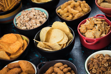 Salty snacks served in bowls