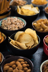 Salty snacks served in bowls