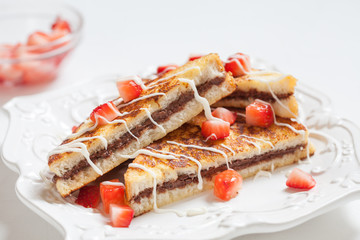 French toasts with chocolate hazelnut filling and strawberry