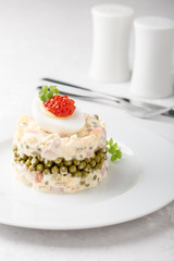 Russian Olivier salad with red caviar on top