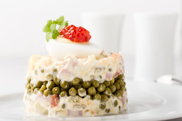 Russian Olivier salad with red caviar on top