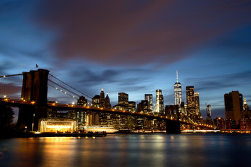 Fototapeta na wymiar New York City Manhattan Downtown with Brooklyn Bridge at dusk