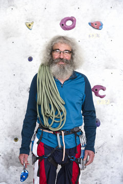 Portrait of a senior man rock climber