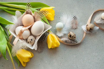  Easter card with eggs, feathers and flowers