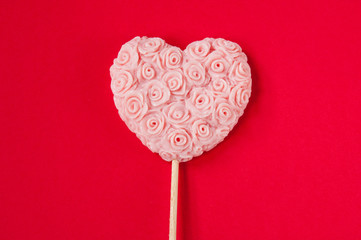  Valentine's lollipop with pink roses on a red background