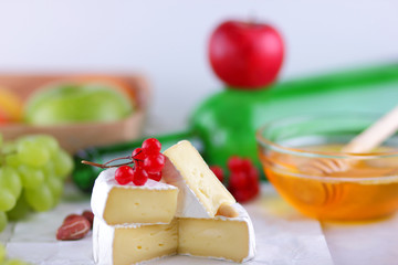 Cheese, camembert, honey, green bottle, red berries, apples, pears, cheese with green grapes, peanuts, pink flower, minimalism, healthy food, French breakfast, pop art, retro style