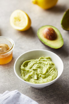Prepared avocado mask in bowl.