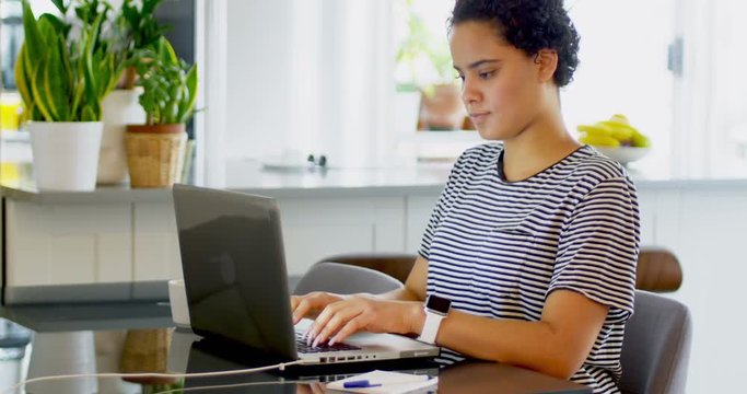 Young woman using laptop 