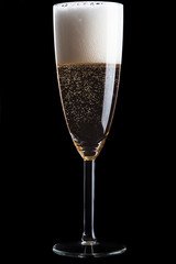 Champagne glass on black background