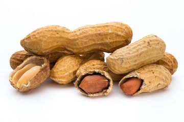 Dried peanuts on the white background.