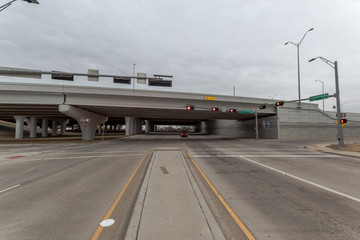 Empty underpass on a early Satueday morning with a sky full of altocumulus clouds presenting a...