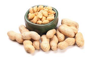 Roasted peanuts isolated on white