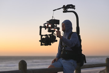 Man with stabiliser camera rig