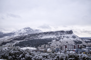 Fototapeta na wymiar Snow Covered Arthurs Seat Hill