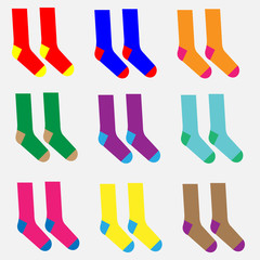 Nine pairs of different colorful socks vector