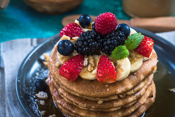 Perfect pancakes with fresh forest fruits