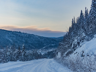 beautiful morning scene of forest frozen on tombstone mountain