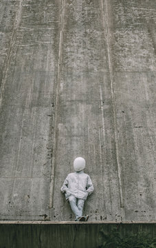 Abstract scene with person with white helmet/mask and silver jacket