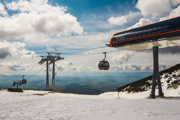Fototapeta premium Ropeway from Tatranska lomnica to Skalnate pleso in High Tatra mountains, Slovakia