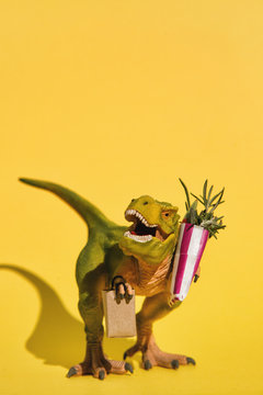 Small tyrannosaurus with paper bags