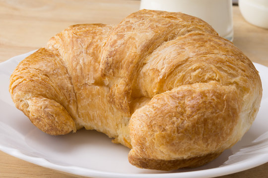 croissant on white plate