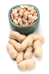 Roasted peanuts isolated on white